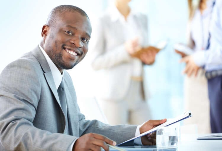 Portrait of a cheerful business worker smiling at the camera