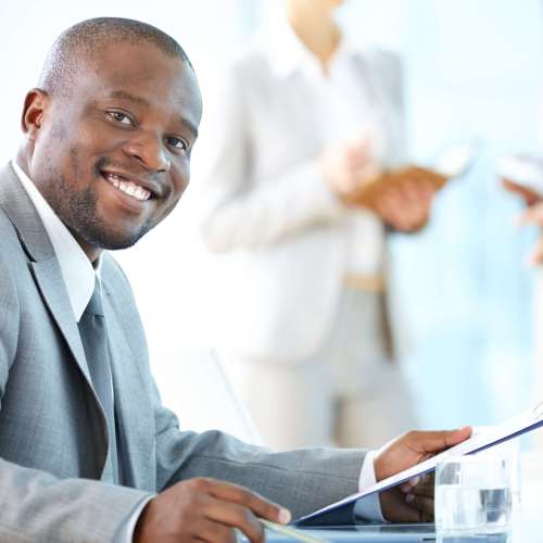 Portrait of a cheerful business worker smiling at the camera